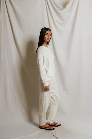Woman in a white sweater