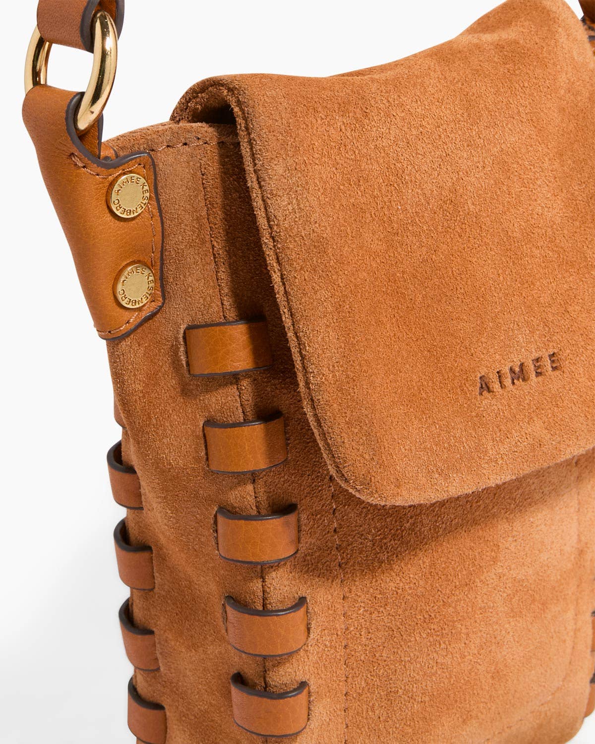 Tan suede leather crossbody phone bag with gold rivets and laced accents.