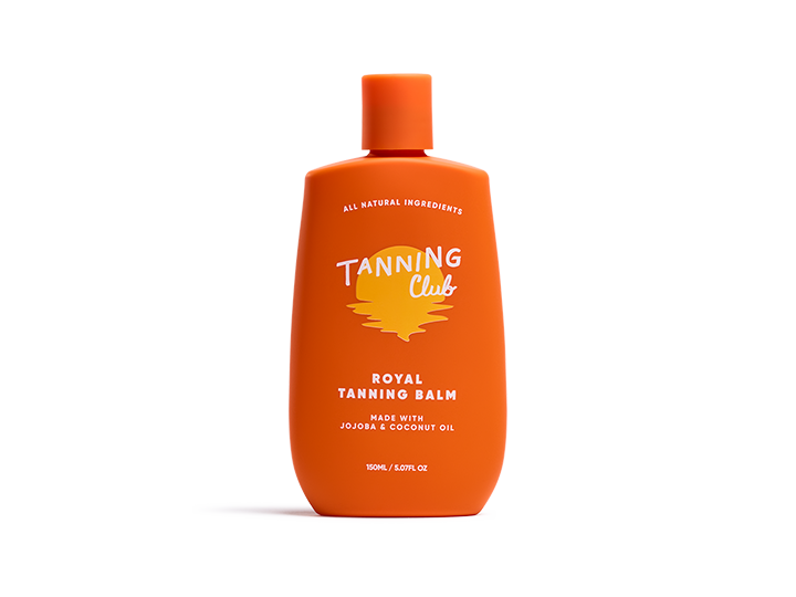 Orange bottle of tanning balm made with coconut and jojoba oils, shown against a white background.