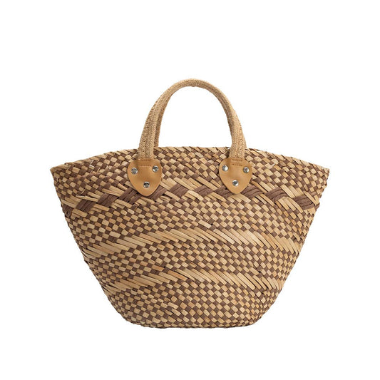 Natural straw vegan tote bag with short handles and zigzag pattern, suitable for summer use.