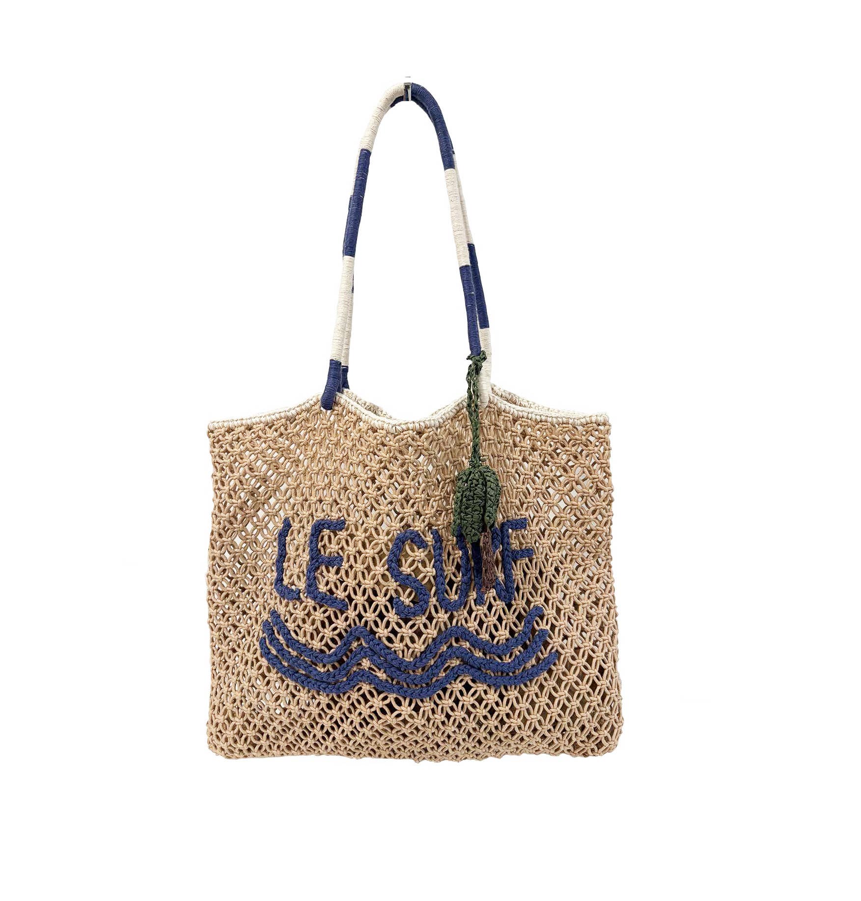 Macrame tote with wave pattern, striped handles, and green tassel; ideal for carrying essentials on sunny days.