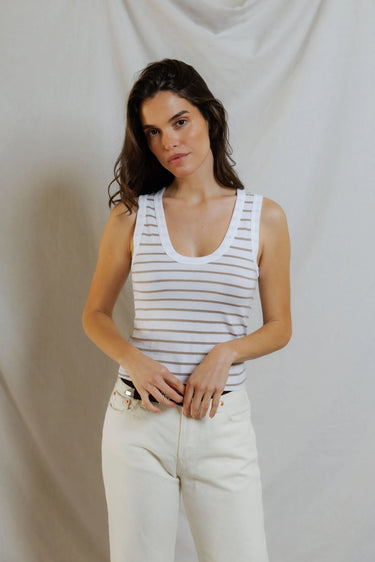 Woman in a white striped tank
