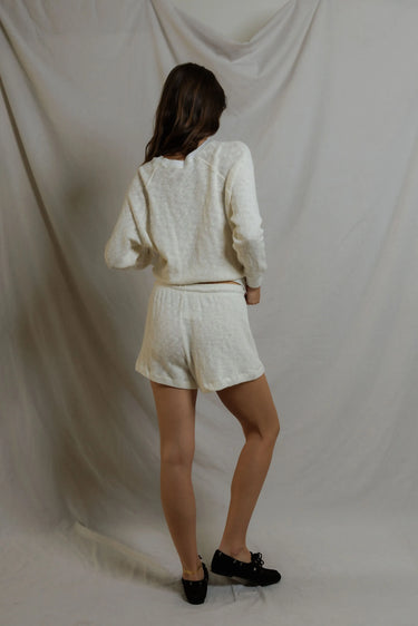 Woman in white shorts