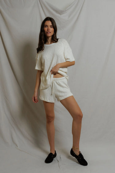 Woman in white shorts