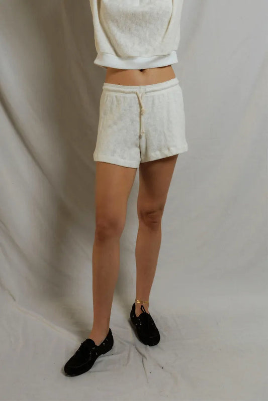Woman in white shorts
