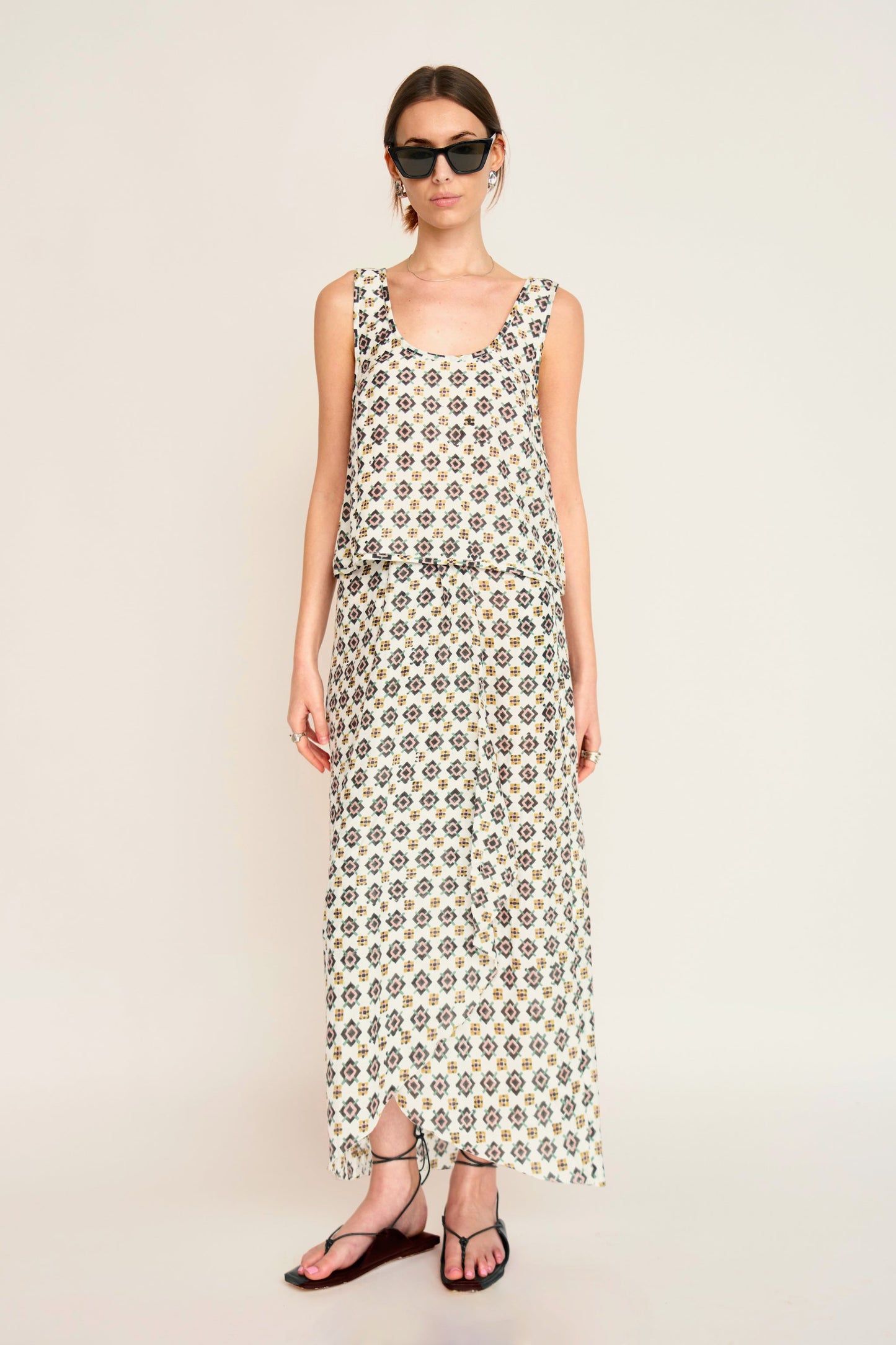 Woman in a patterned white skirt