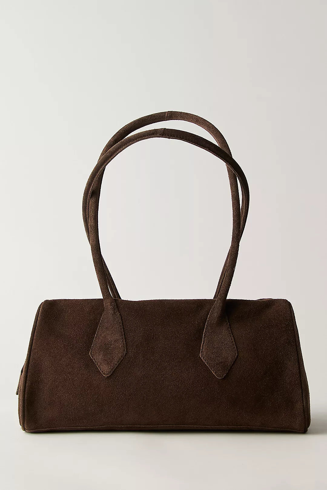 Chocolate suede shoulder bag with two long handles, ideal for carrying essentials, displayed on a plain background.