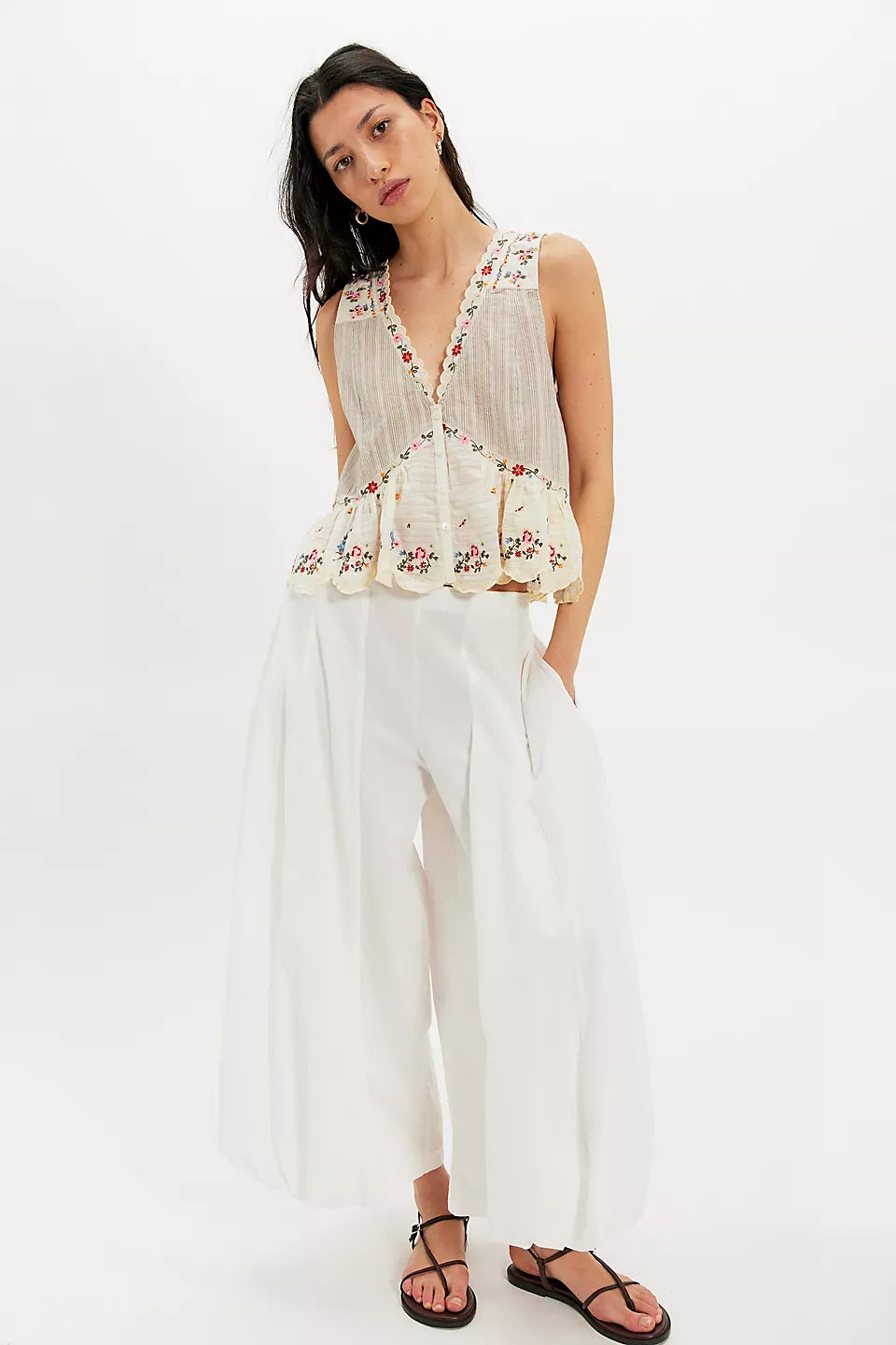 Woman wearing a floral sleeveless top