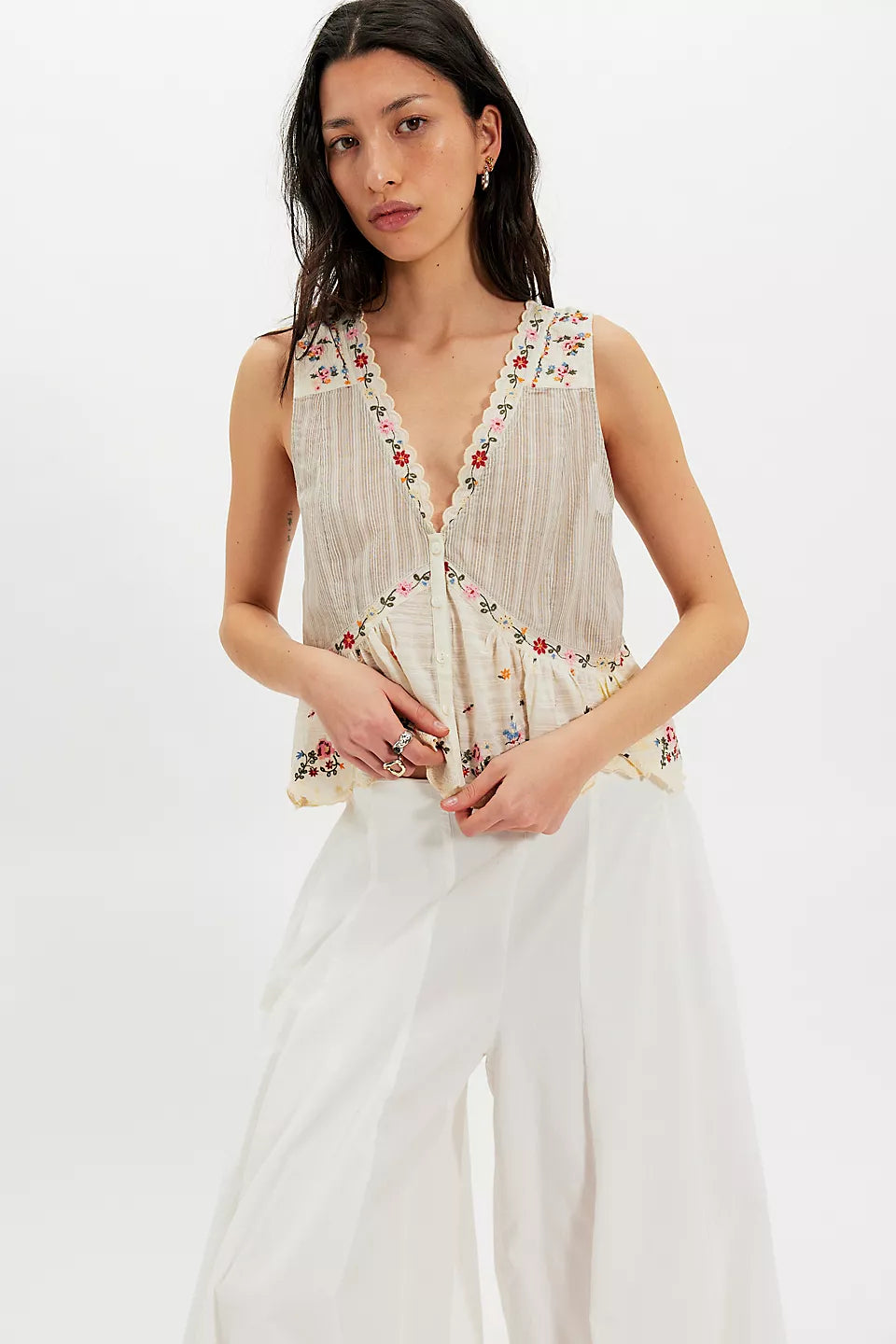 Woman wearing a floral sleeveless top