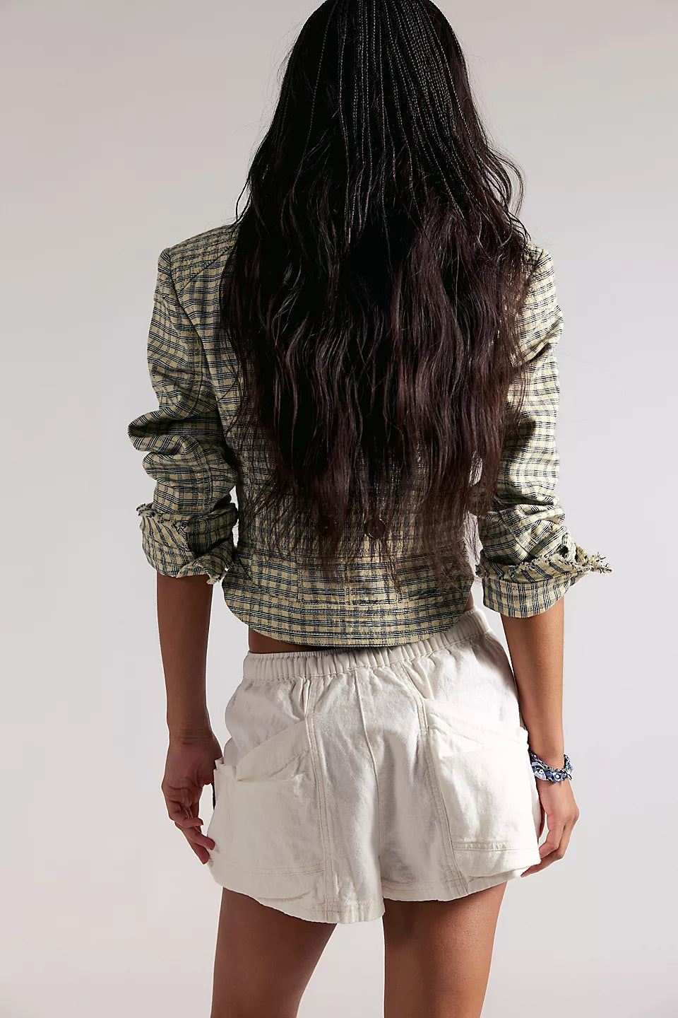 Woman wearing white shorts 