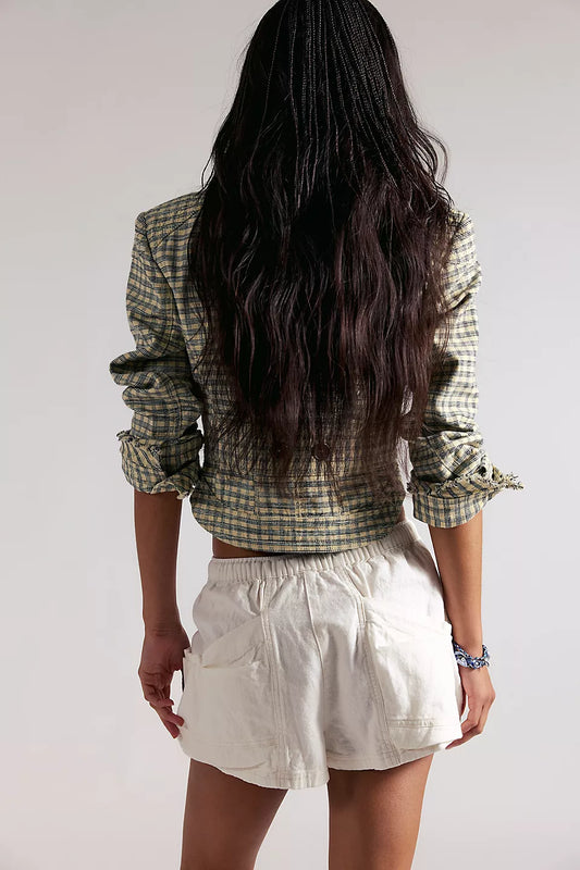 Woman wearing white shorts 