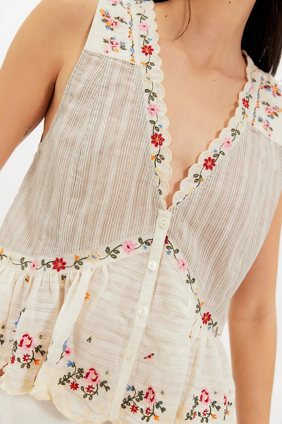 Woman wearing a floral sleeveless top