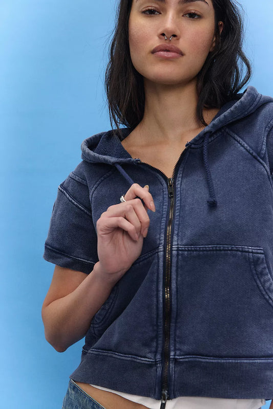 Woman wearing a blue hoodie