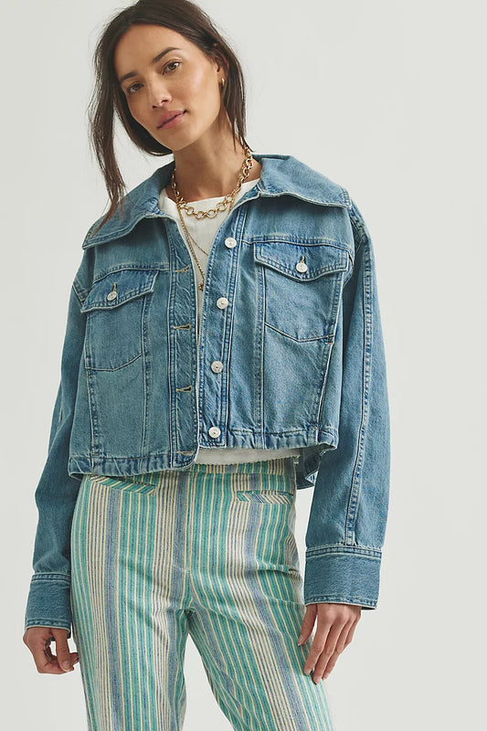 Woman wearing a denim jacket 